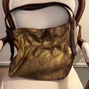 HOLDING HORSES from ANTHROPOLGIE ANTIQUE GOLD HOBO BAG